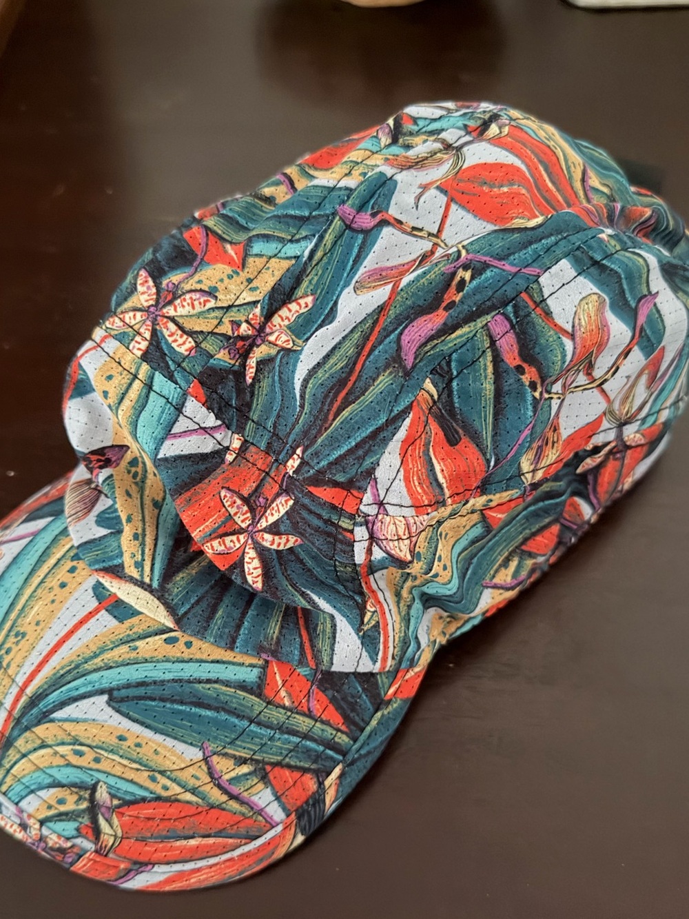 Janji Multicolor Floral Run Performance Cap with Teal, Coral, Yellow and White